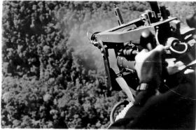 UH-1F mini-gun fire, Ralph Graves photo